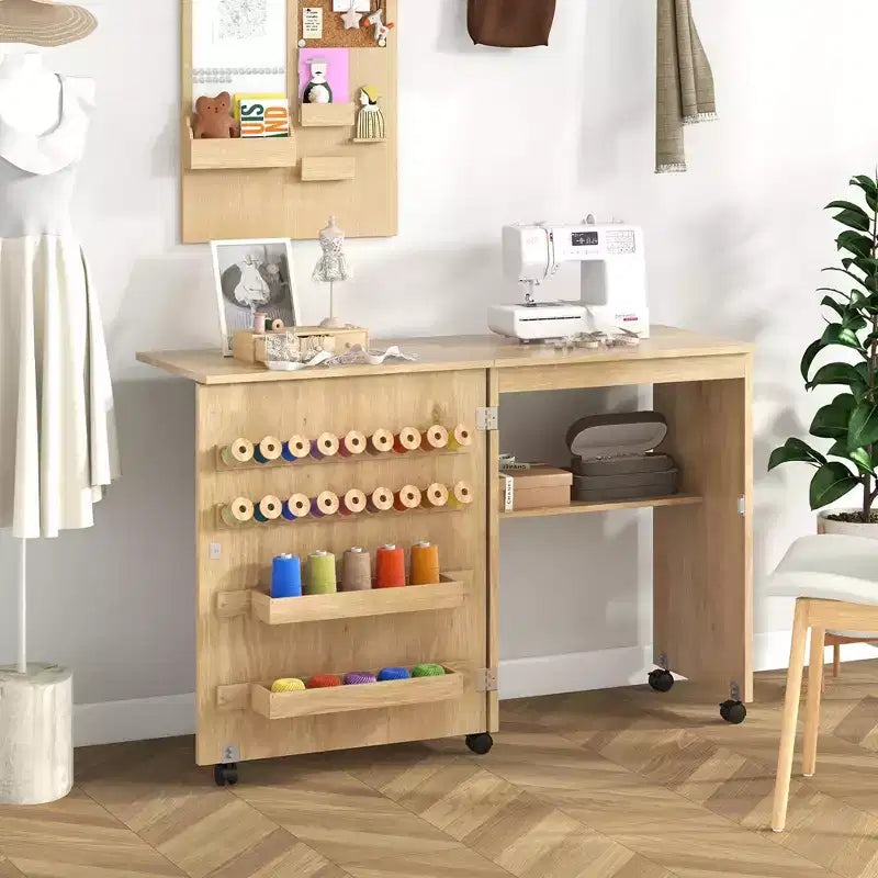Table à coudre pliante avec bacs de rangement, chevilles et roulettes verrouillables