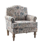 Fauteuil rembourré en bois avec motif floral, accoudoirs à panneaux et dossier en forme de bosse de chameau.