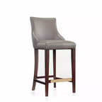Tabouret de bar tapissé de similicuir avec cadre et repose-pieds en hêtre