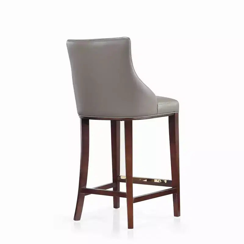 Tabouret de bar tapissé de similicuir avec cadre et repose-pieds en hêtre