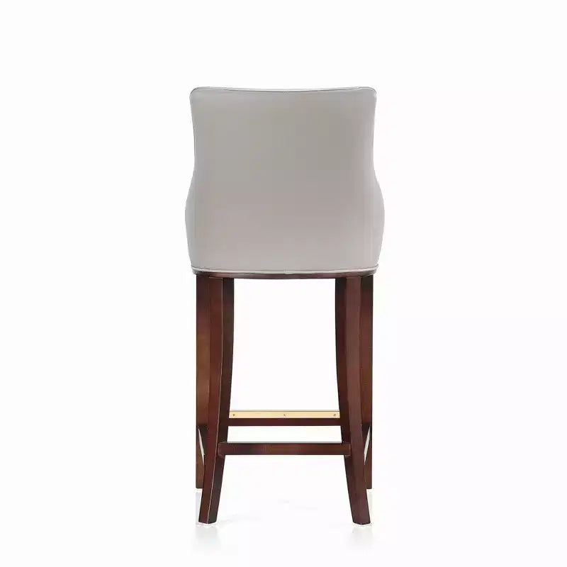 Tabouret de bar tapissé de similicuir avec cadre et repose-pieds en hêtre