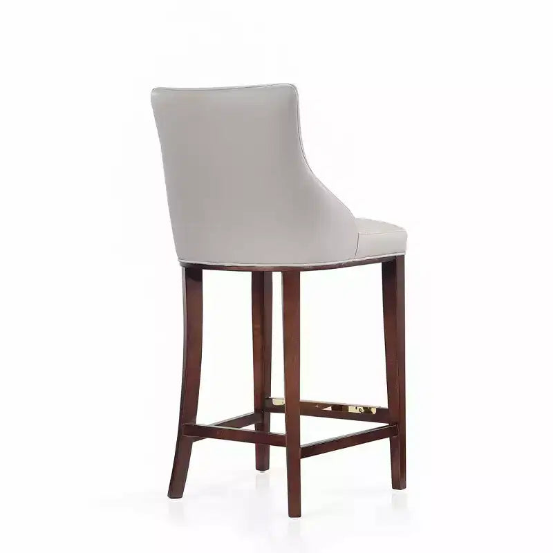 Tabouret de bar tapissé de similicuir avec cadre et repose-pieds en hêtre