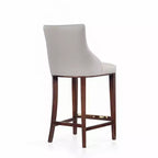 Tabouret de bar tapissé de similicuir avec cadre et repose-pieds en hêtre