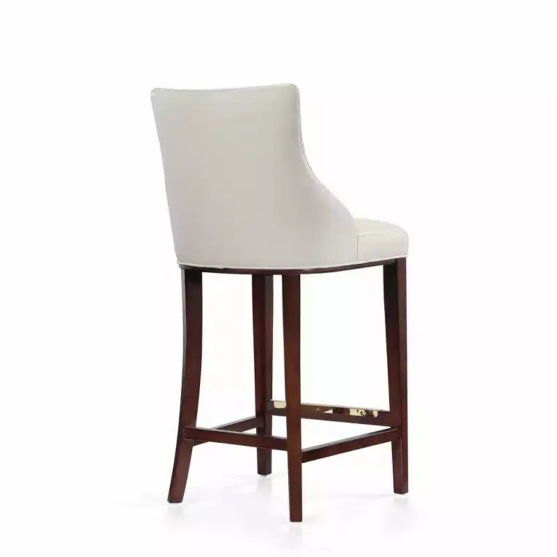 Tabouret de bar tapissé de similicuir avec cadre et repose-pieds en hêtre