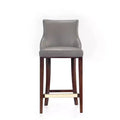 Tabouret de bar tapissé de similicuir avec cadre et repose-pieds en hêtre