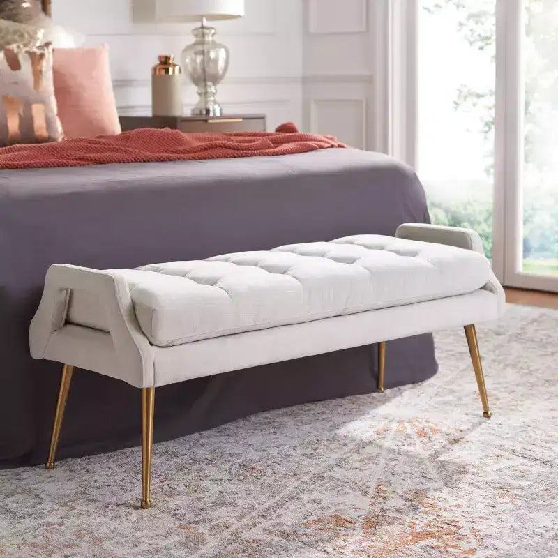 Banc rembourré avec coussin capitonné et pieds en métal doré