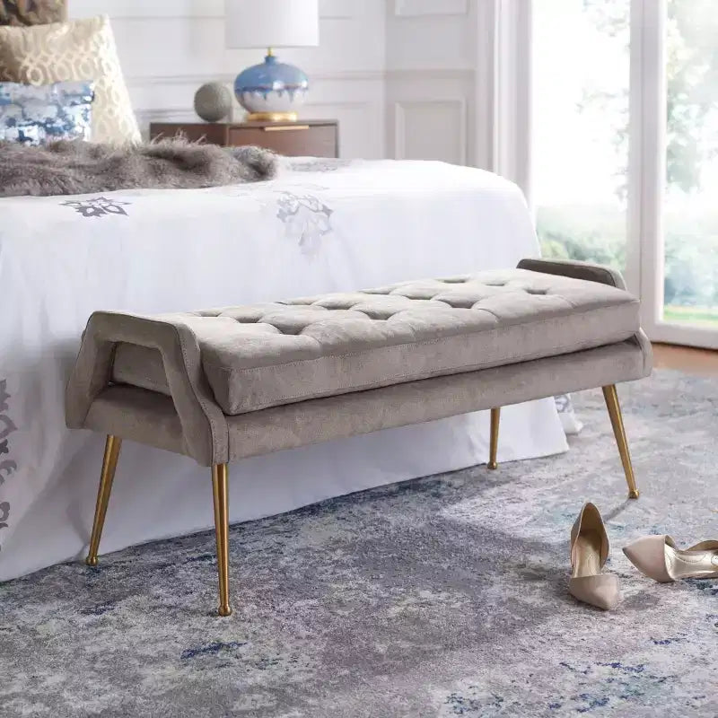 Banc rembourré avec coussin capitonné et pieds en métal doré